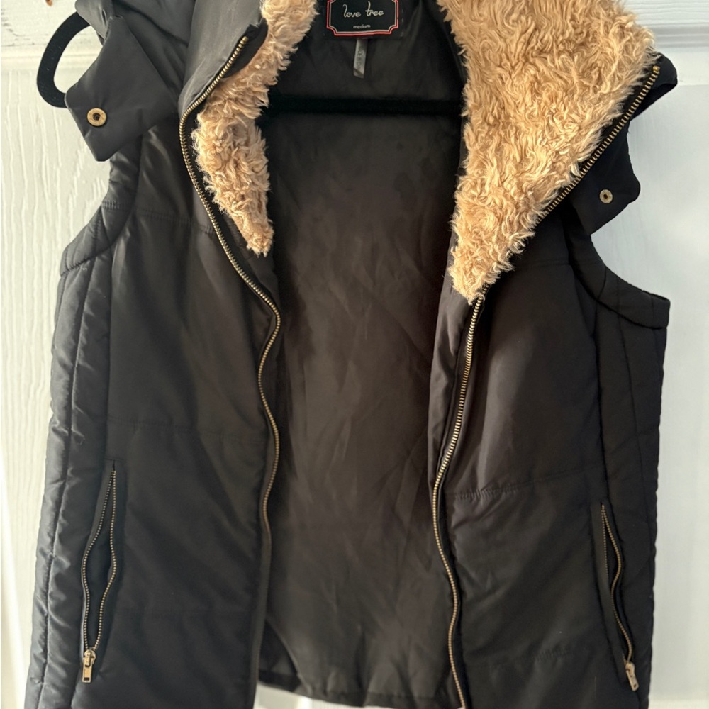 Love Tree Black Faux Fur Hooded Vest perfect condition. The hood does not detach